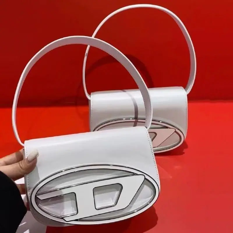 2026 D-letter Dingdang fashionable messenger bag for women, small square shoulder bag, silver color, cross-body style
