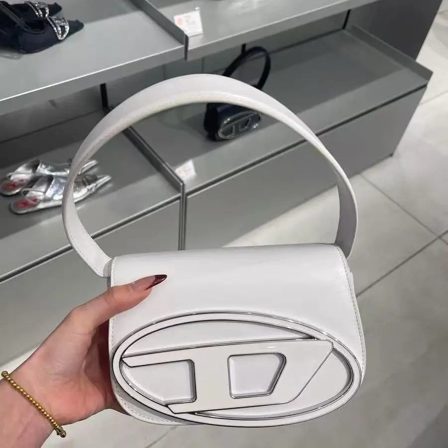 2026 D-letter Dingdang fashionable messenger bag for women, small square shoulder bag, silver color, cross-body style